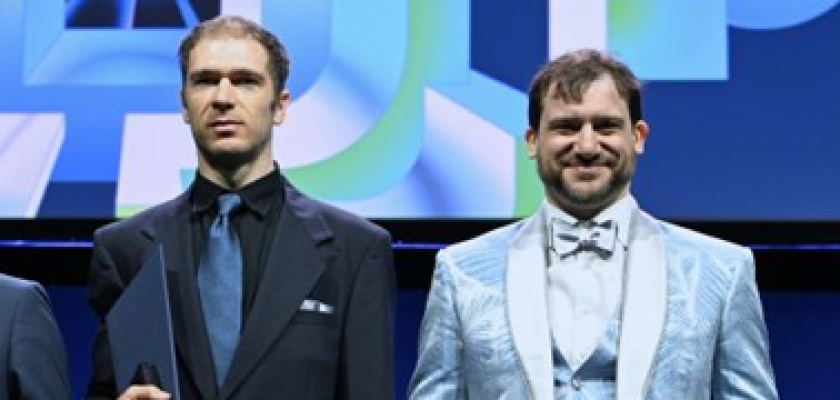 Hong Wang and Yu Deng receive the Fields Medal after their Ambrosetti Medal recognition